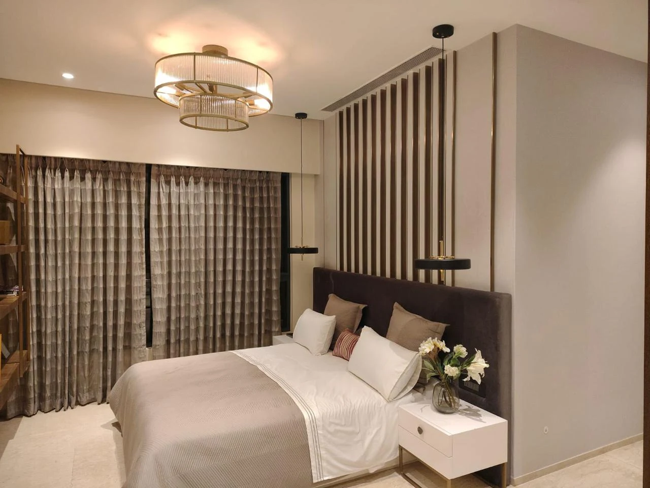 Estella bedroom with upholstered headboard and pendant lighting