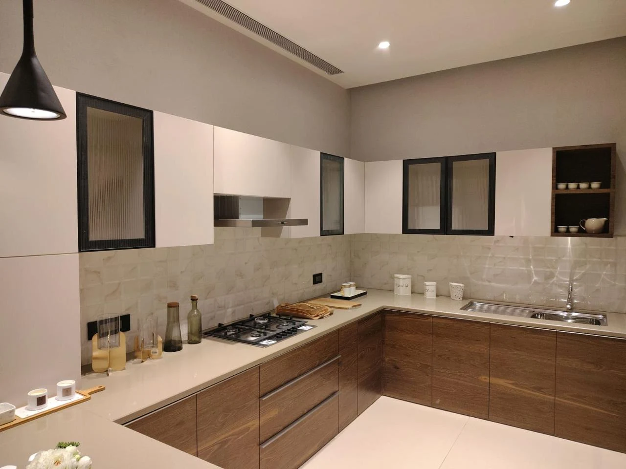 Estella kitchen with wood cabinetry and an L-shaped counter